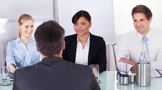 Businesspeople In An Interview